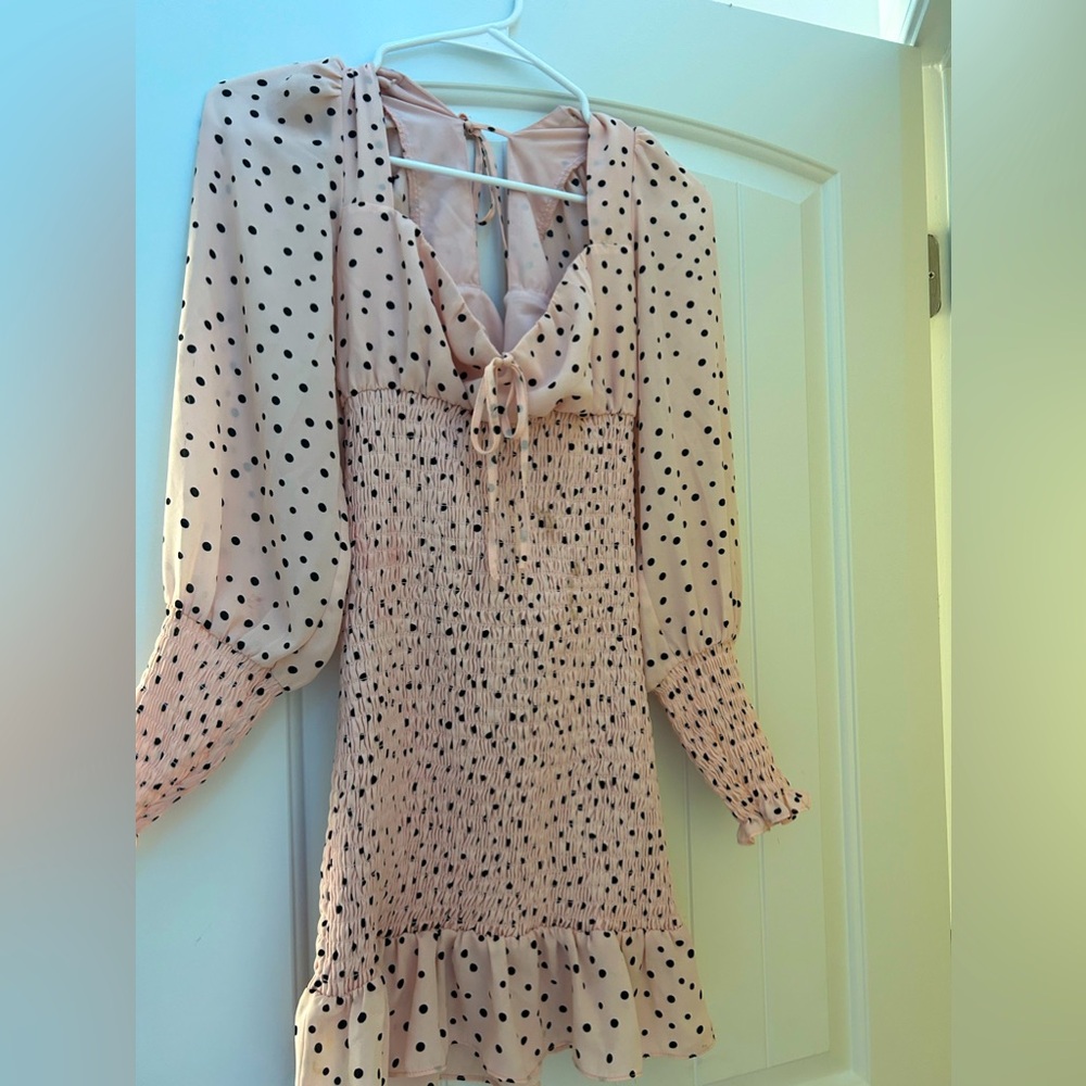Mesmerizing pink polkadot dress.